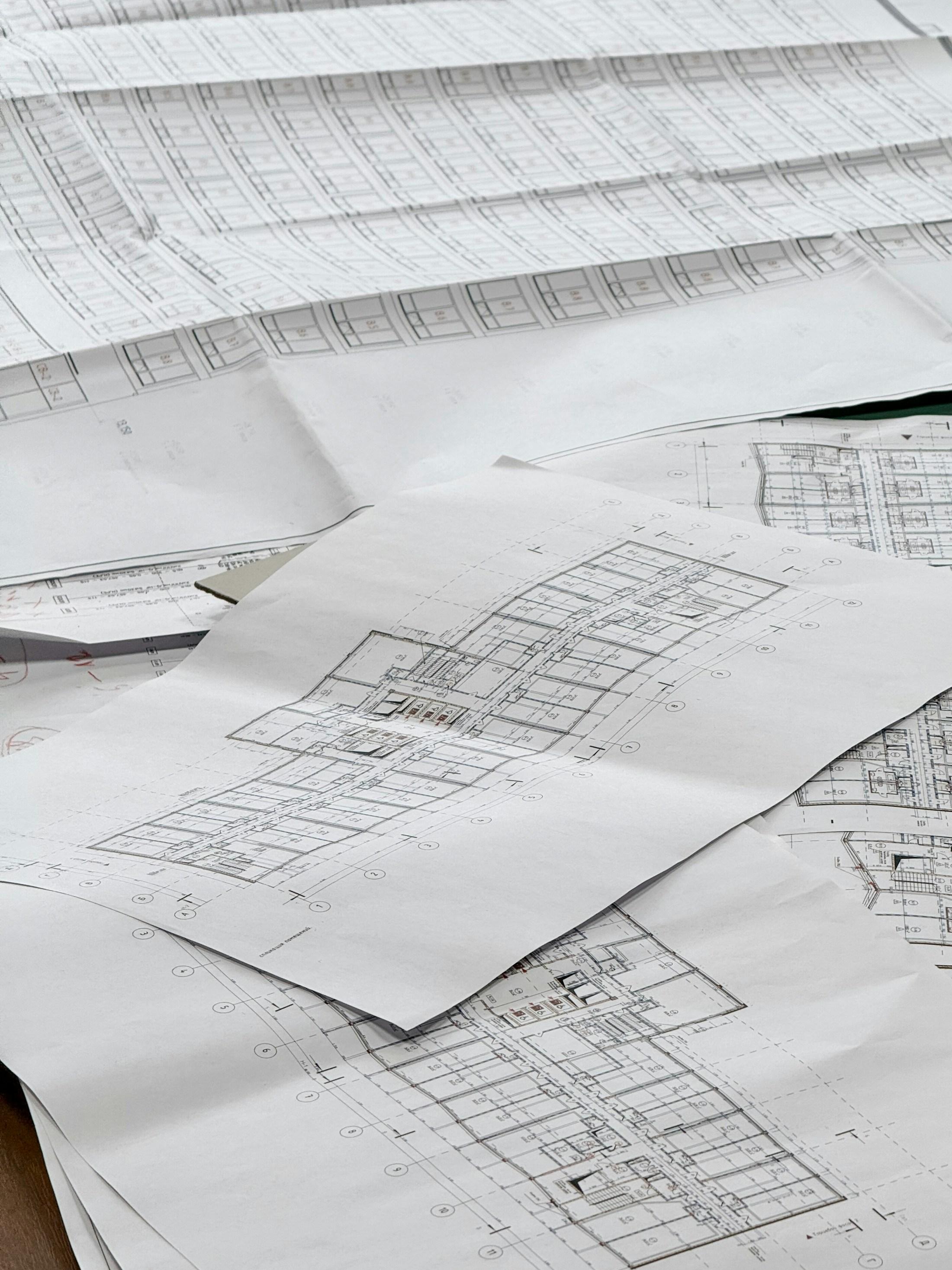 Architectural plans and blueprints laid out for a home project